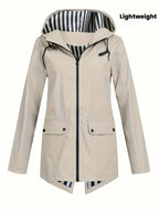 Women's hooded rain jacket with striped lining and flap pockets