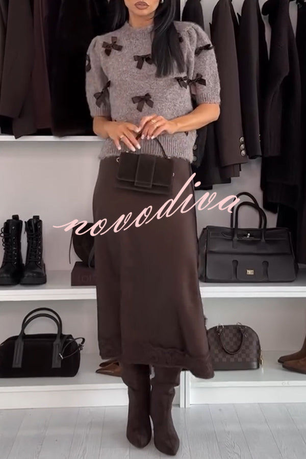 Women's brown knit crop top with dark bow details and short sleeves