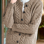 Women's textured cable knit cardigan with crew neck, long sleeves and button front