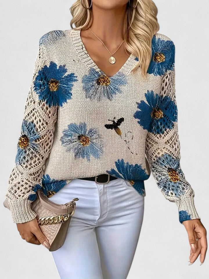 Women's floral V-neck sweater with long sleeves and open-knit sleeve panels