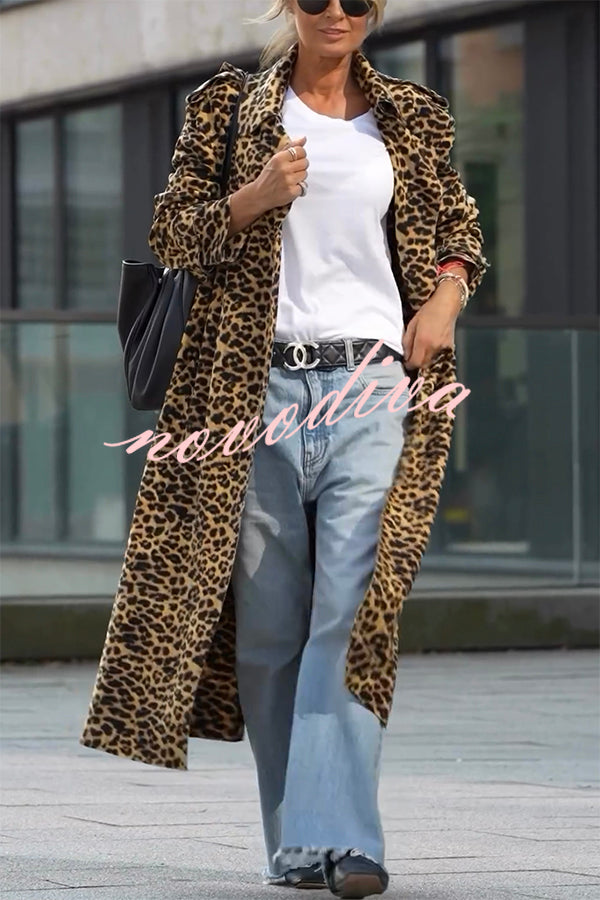 Woman wearing a leopard print long sleeve midi trench coat