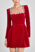 Women's velvet mini dress with embellished square neckline, long sleeves and flared skirt