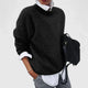 Women's relaxed crew neck sweater with long sleeves and ribbed trims