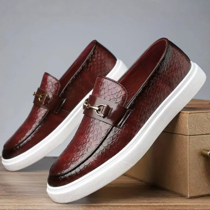 Embossed slip-on loafers with gold bit detail and flat contrasting soles