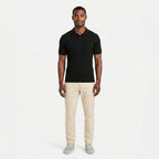 Men's ribbed knit polo shirt with short sleeves and button placket