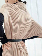 Women's ribbed high neck sweater with an asymmetric split front