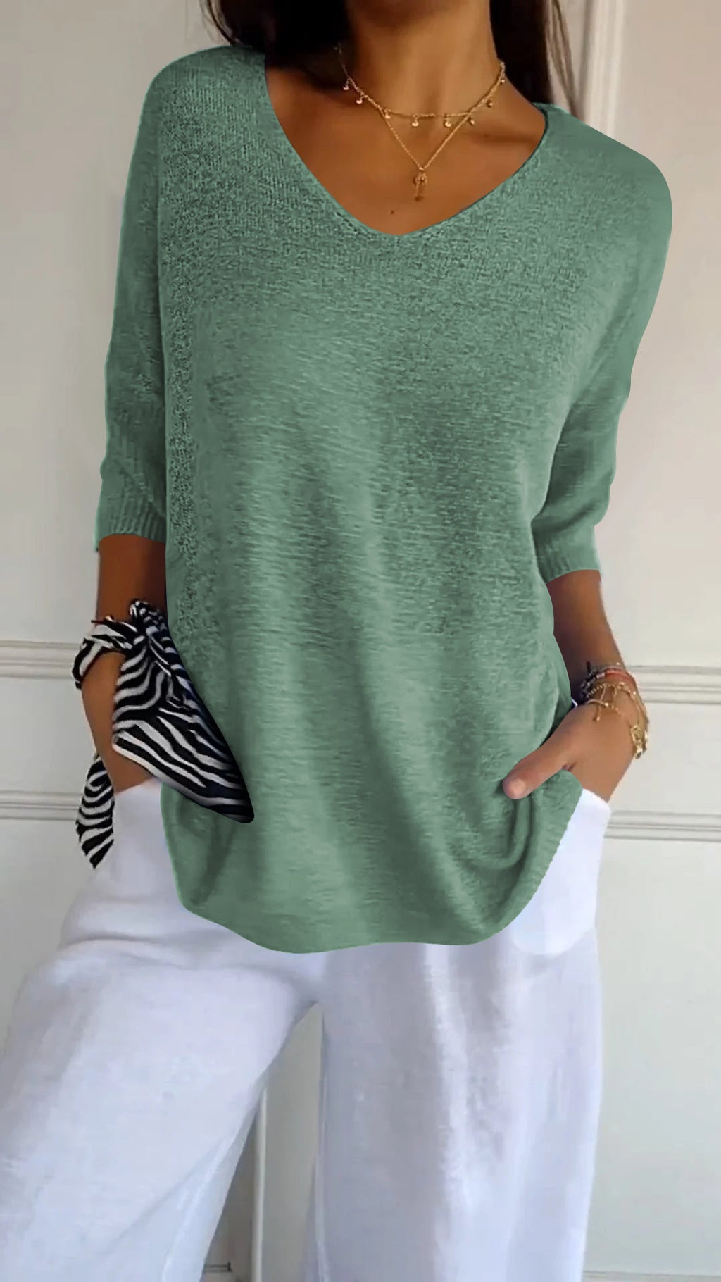 Women's solid-colour knitted V-neck top with long sleeves