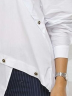 Women's white asymmetric button front blouse with long sleeves
