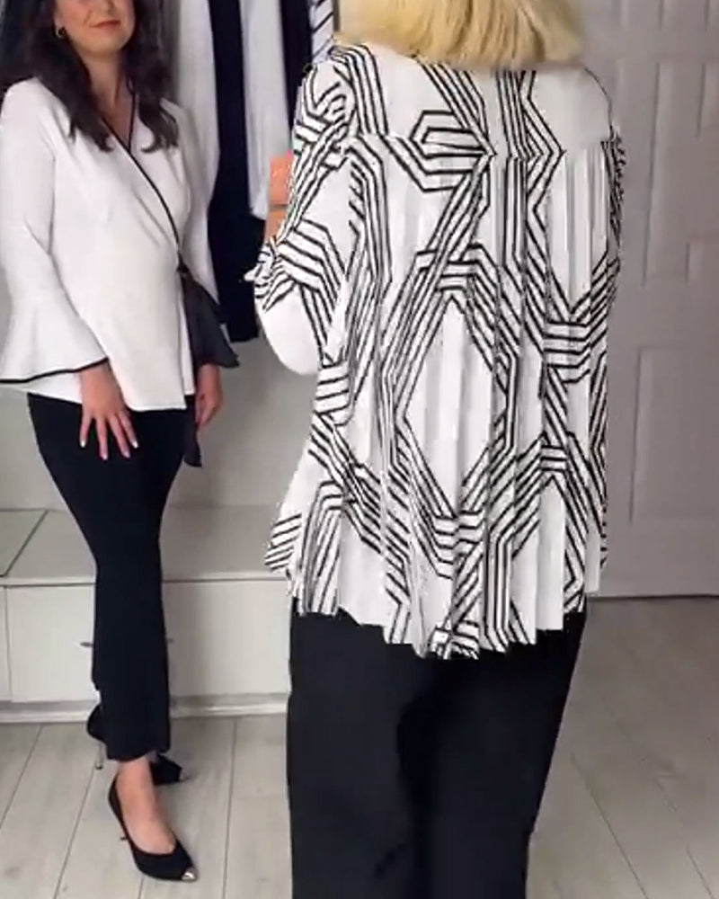 Women's black geometric pleated blouse with V-neckline and long sleeves