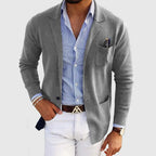 Men's tailored blazer with notched lapels, long sleeves, buttons and patch pockets