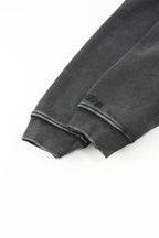 Men's black zip-up hoodie jacket with front pockets and vintage finish
