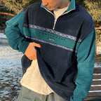 Men's geometric half-zip mock neck sweater with contrasting panels