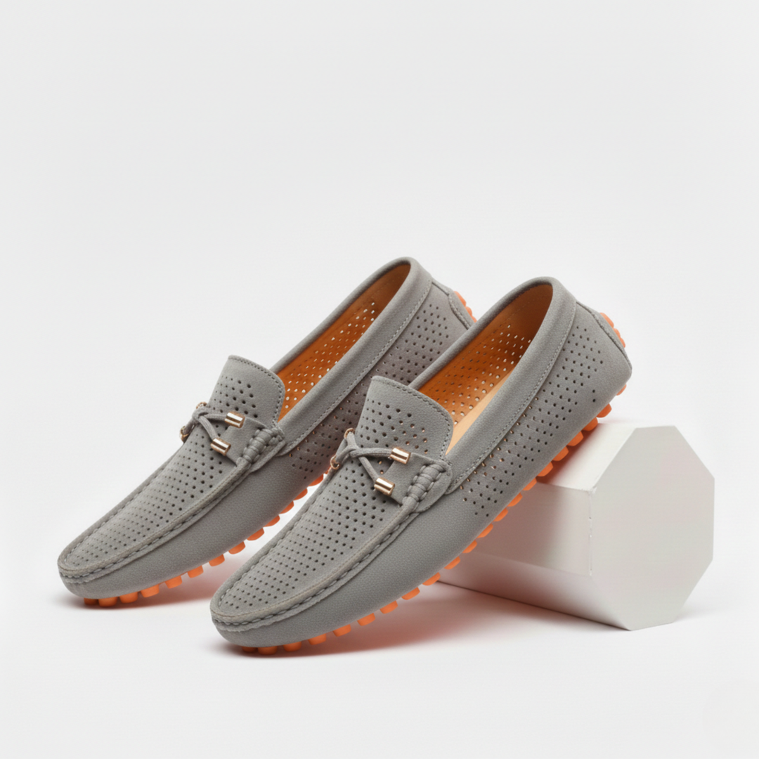 Men's perforated loafers with moc toe stitching and decorative front trim