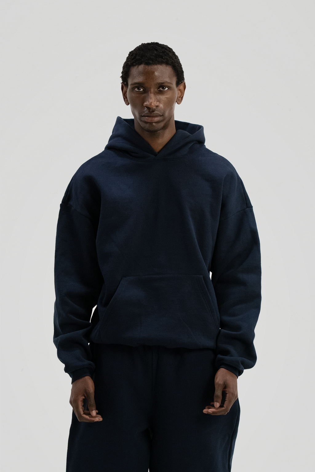 Dark navy men's core hoodie with hood and long sleeves