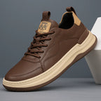 Low-top panelled lace-up trainers with contrasting sole and pull tabs