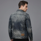 Men's faded blue denim jacket with long sleeves, zip front and chest pockets
