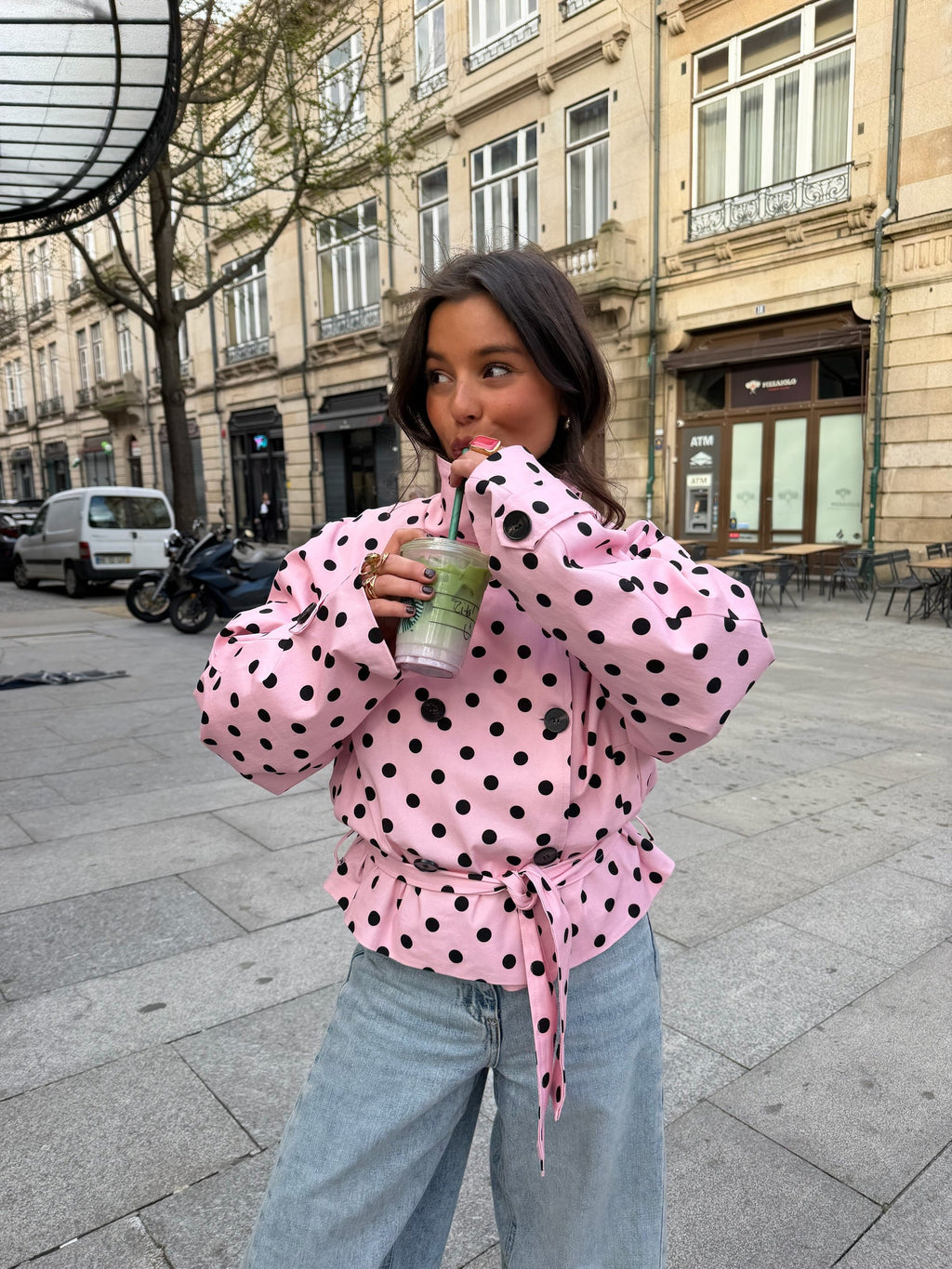 Women's pink cropped polka dot trench coat with high collar and waist tie