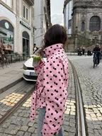 Women's pink cropped polka dot trench coat with high collar and waist tie
