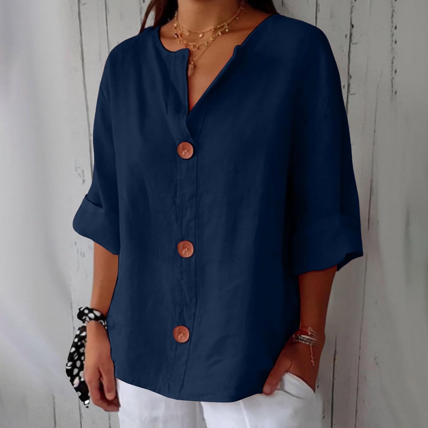 Women's relaxed V-neck shirt with button front and 3/4 sleeves