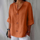 Women's relaxed V-neck shirt with button front and 3/4 sleeves