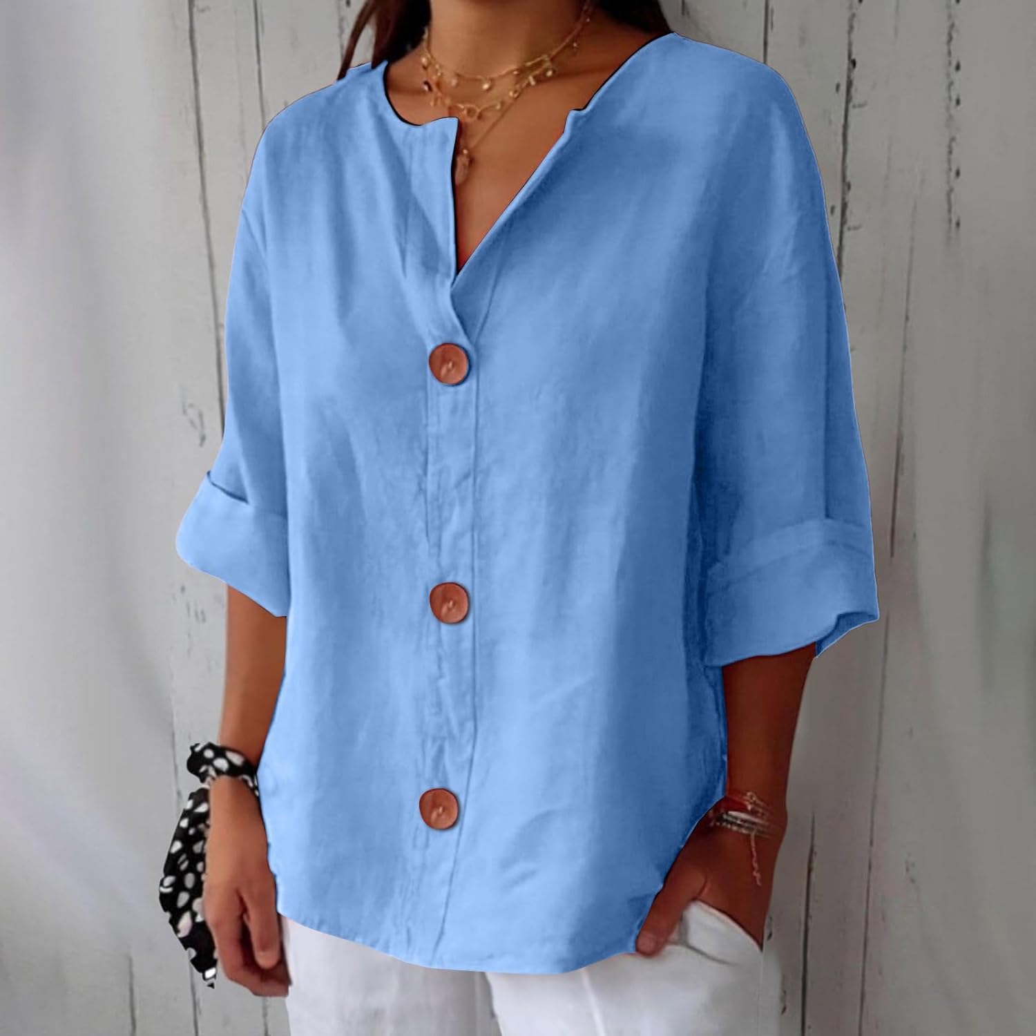 Women's relaxed V-neck shirt with button front and 3/4 sleeves