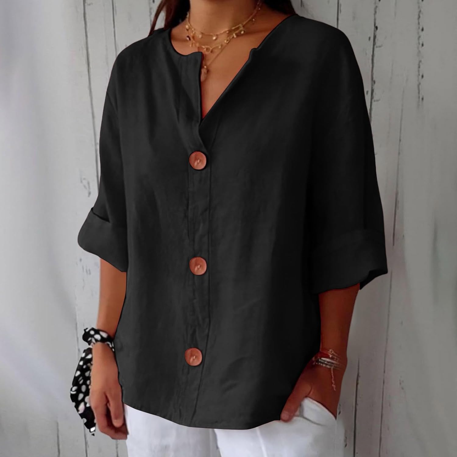 Women's relaxed V-neck shirt with button front and 3/4 sleeves