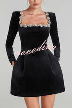 Women's velvet mini dress with embellished square neckline, long sleeves and flared skirt