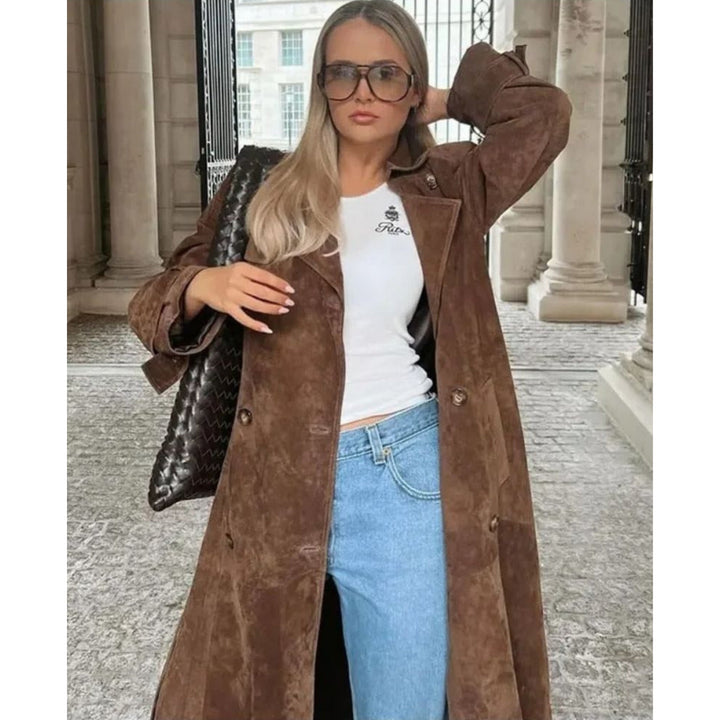 Women's long brown trench coat with lapel collar and button fastening