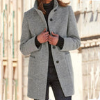 Women's button front coat with raised collar, long sleeves and front pockets