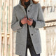 Women's button front coat with raised collar, long sleeves and front pockets