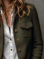 Women's olive herringbone blazer with button front, flap pockets and contrast trim