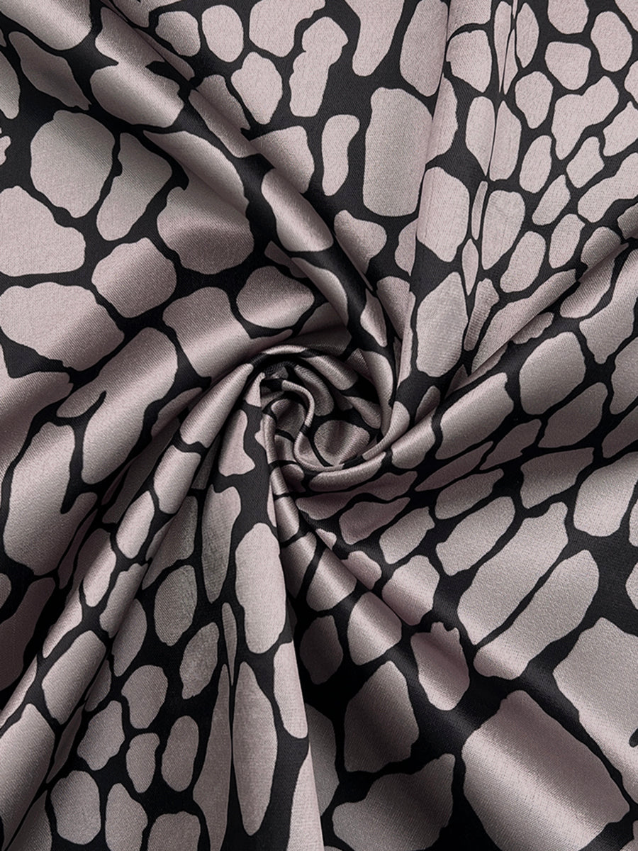 Women's grey and black snakeskin print blouse with lapel collar and long sleeves