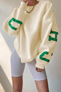 Women's crew-neck sweatshirt with contrasting letter graphics on the sleeves