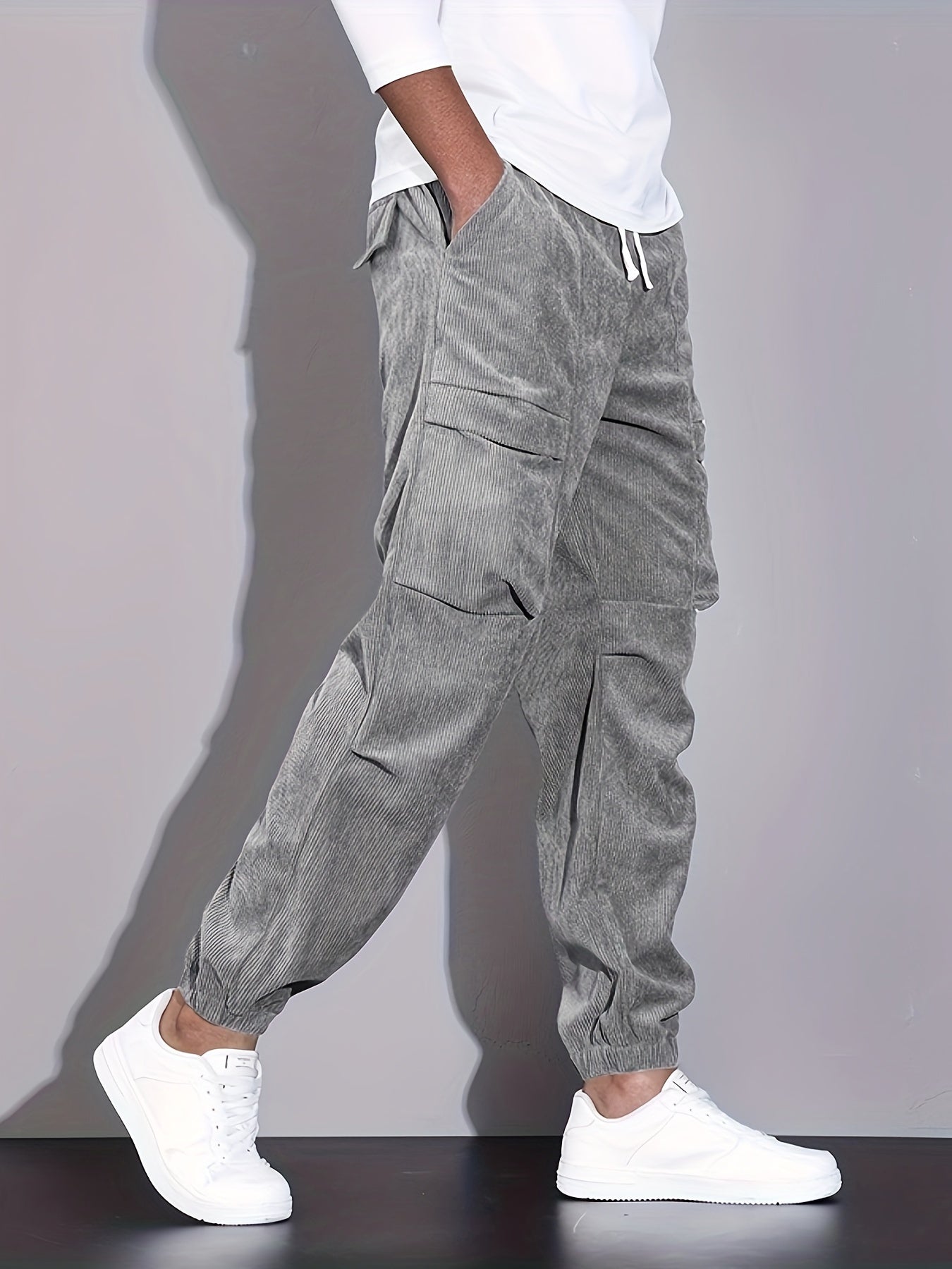 Men's corduroy cargo trousers with drawstring waist and cuffed hems