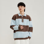Men's black and cream striped polo sweater with long sleeves and button placket