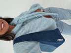 Women's blue striped cardigan with matching scarf