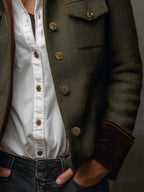 Women's olive herringbone blazer with button front, flap pockets and contrast trim