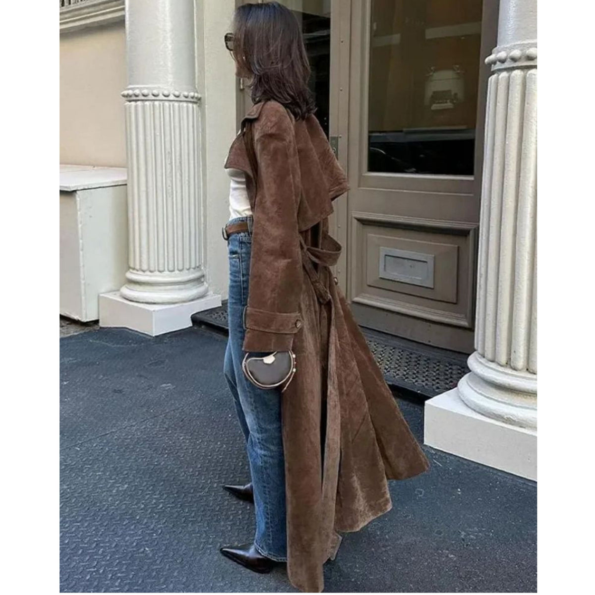 Women's long brown trench coat with lapel collar and button fastening