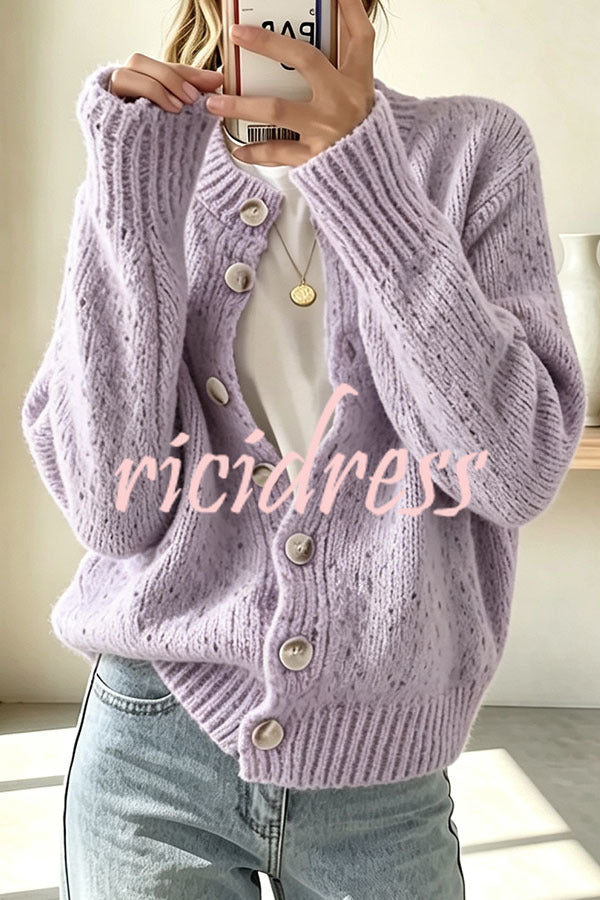 Women's knitted cardigan with scattered dots, long sleeves and button front