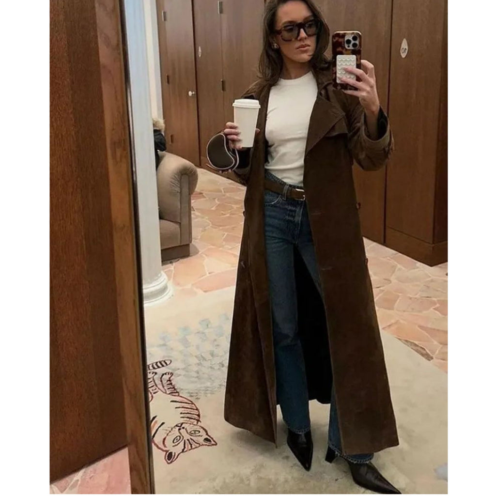 Women's long brown trench coat with lapel collar and button fastening