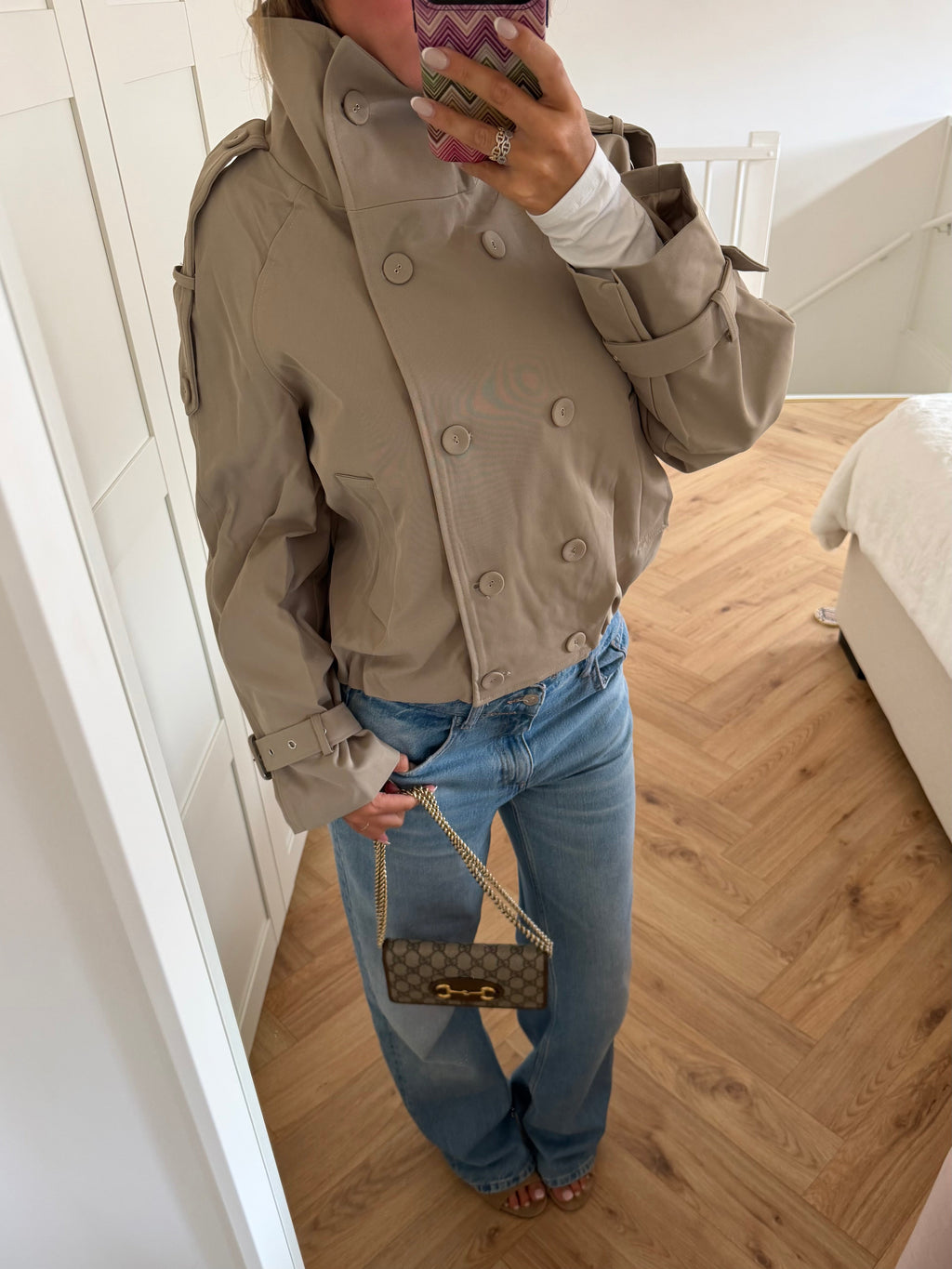 Women's beige cropped double-breasted trench jacket with high collar and belted cuffs