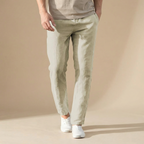 Men's regular fit trousers with an elastic drawstring waist and tapered legs