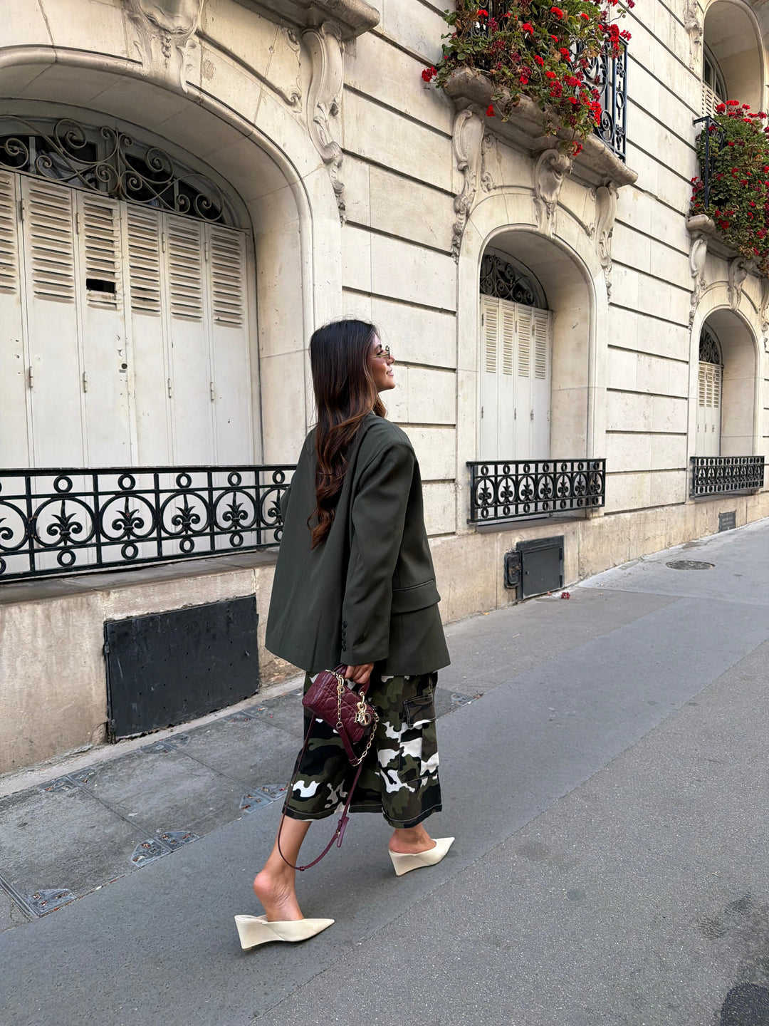 Women's deep green relaxed blazer with notched lapels and long sleeves