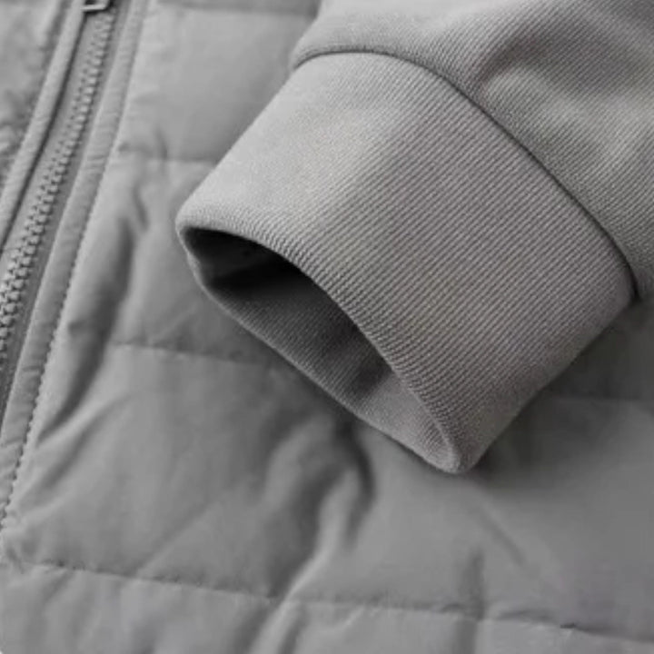 Men's hooded jacket with quilted front panels, knit sleeves and zip front