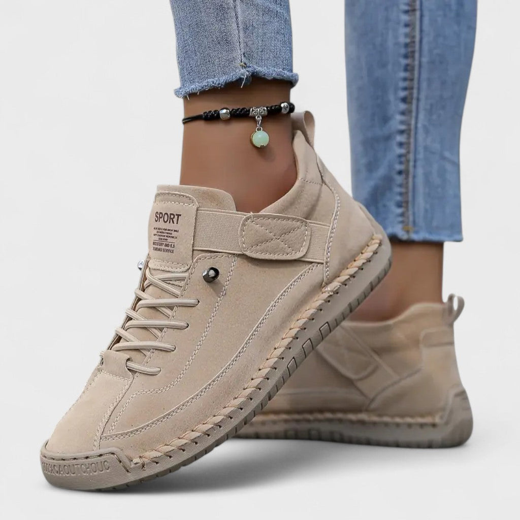 Women's lace-up casual sneakers with ankle strap, stitched panels and textured sole