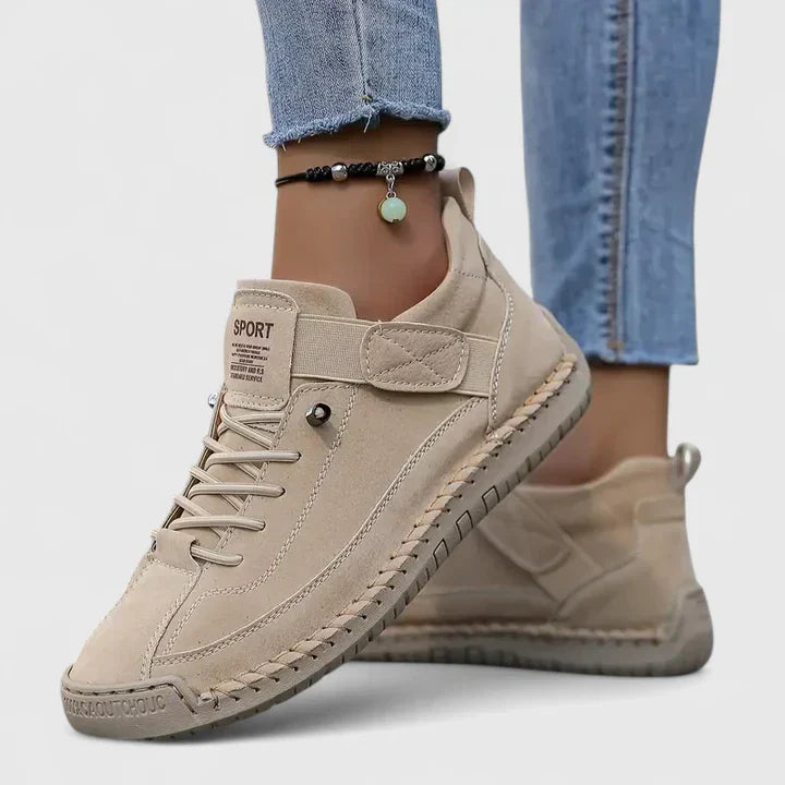 Women's strap sneakers with lace-up fronts and stitched soles