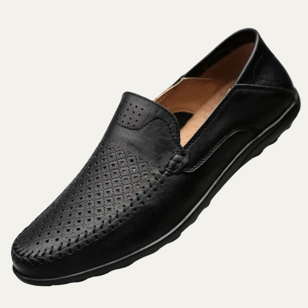 Perforated men's slip-on loafer with rounded toe and flat sole