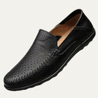 Perforated men's slip-on loafer with rounded toe and flat sole