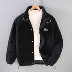 Men's ribbed corduroy padded jacket with high collar, zip fastening and multiple pockets