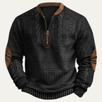 Men's patterned half-zip sweater with mock neck and brown elbow patches